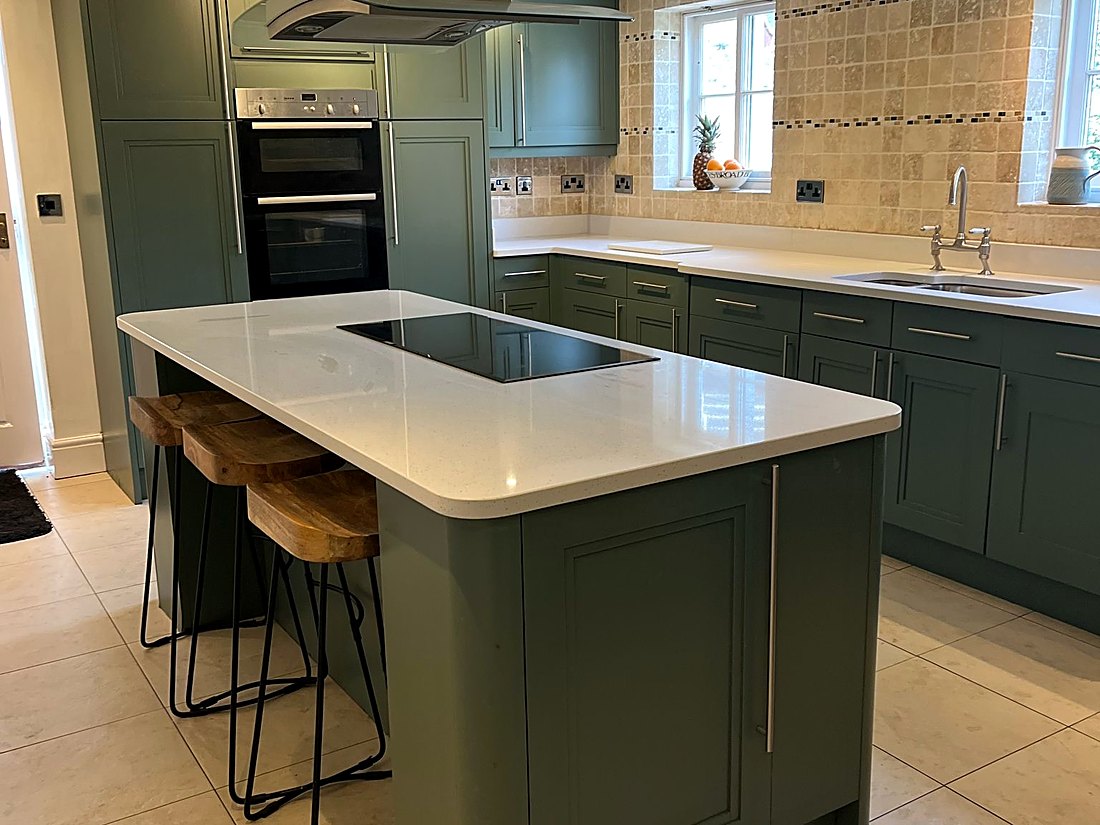 Kitchen spraying Alford — Julia's kitchen, in-frame cabinets sprayed in Farrow and Ball Green Smoke with white worktops by Goodhall Spraying Specialists