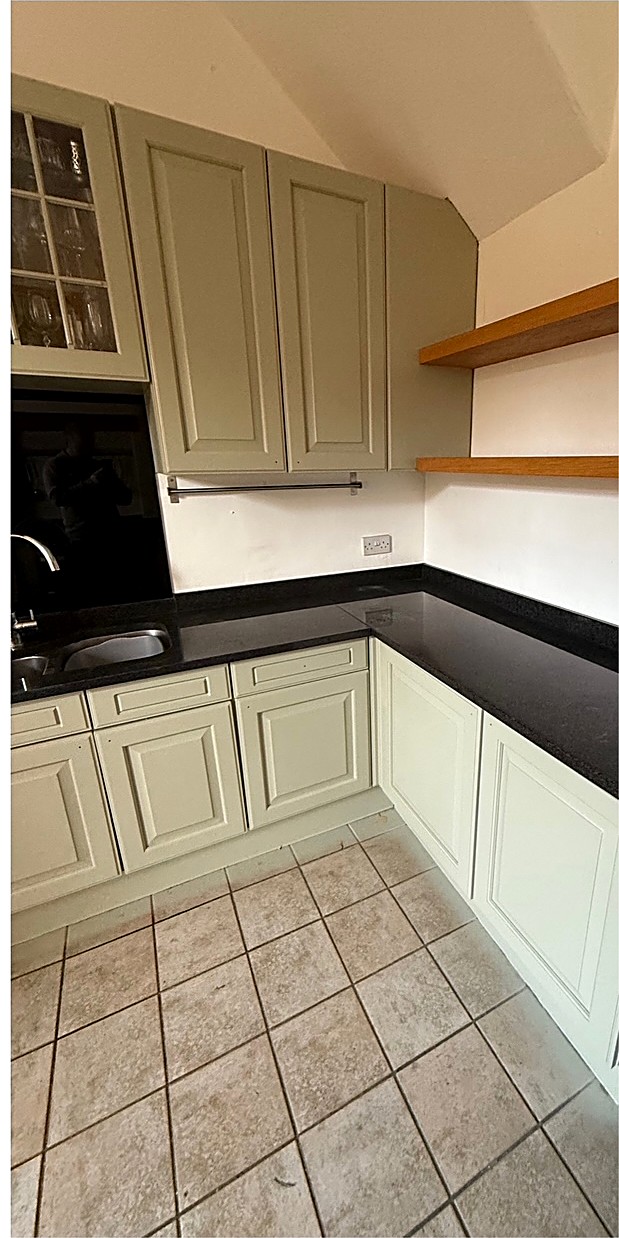 Kitchen respray in Lincoln — oak cabinets sprayed in Farrow and Ball Vert de Terre
